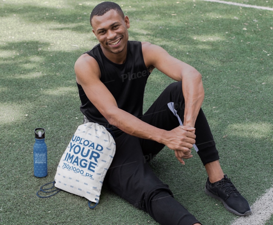 drawstring bag mockup of an athletic guy