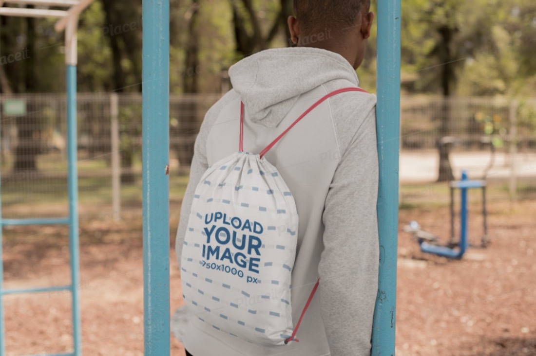 drawstring bag mockup on the back of a man