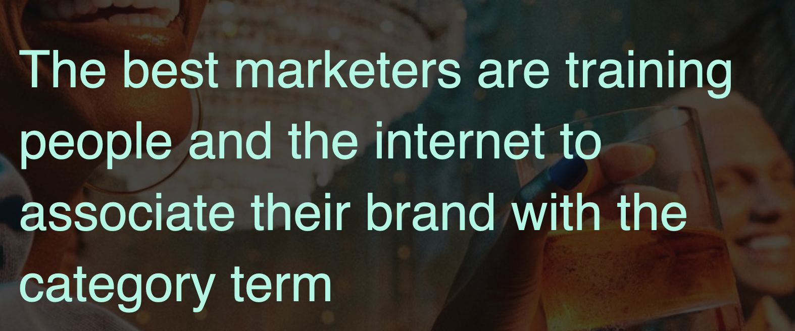 Slide showing “The best marketers are training people and the Internet to associate their brand with the category term.”